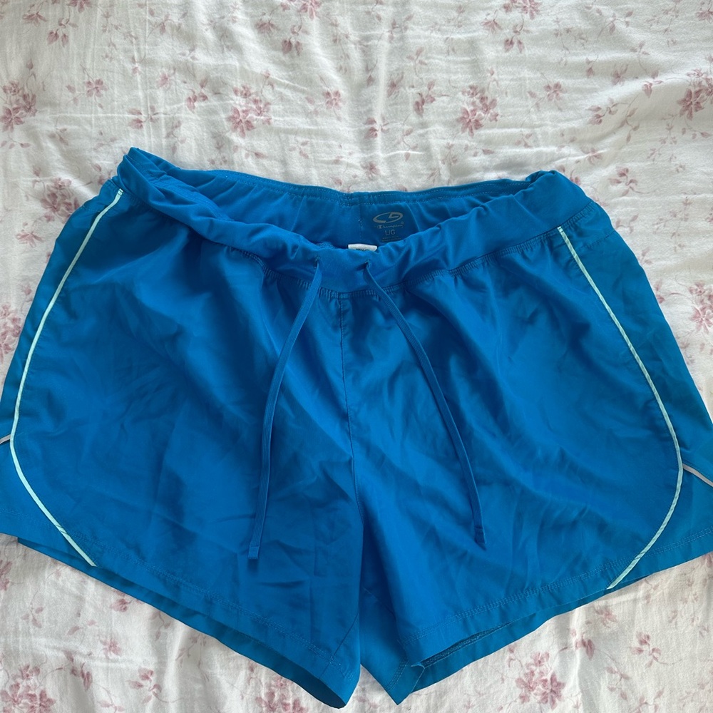Women’s Blue Athletic Champion shorts with white stitching